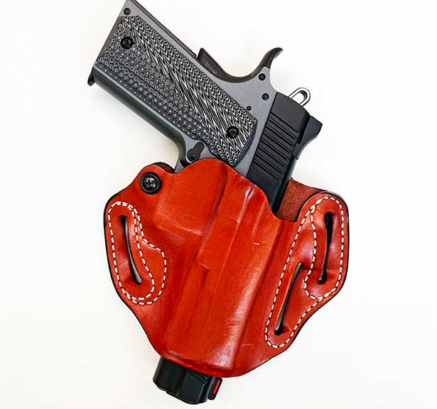 Kimber LW Shadow Ghost .45 ACP 1911 handgun in a DeSantis Mini-Scabbard leather holster