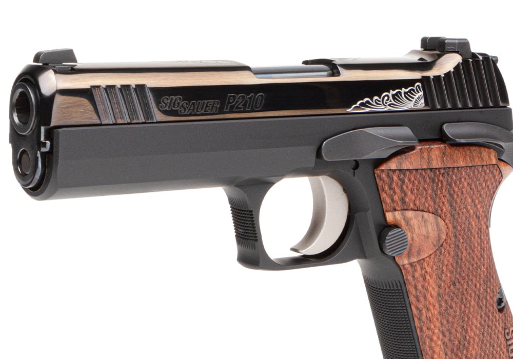 The P210 Carry Custom Works is equipped with slim Caribbean Rosewood grips and an e-nickel coated trigger.