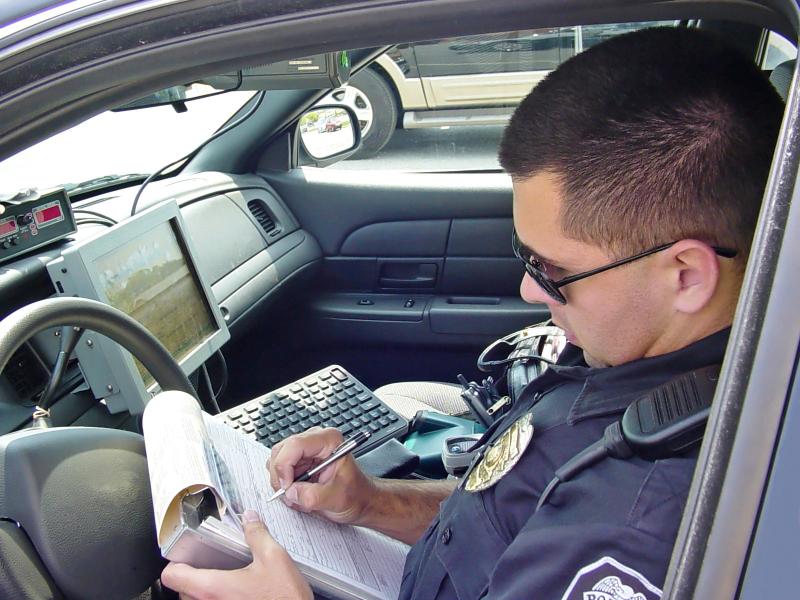 Officer writing a police report