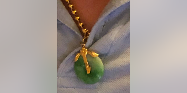 Victim's jade pedant necklace