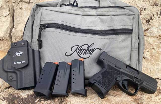 Kimber R& Mako 9mm semi-automatic, spare magazine, holster and carrying bag