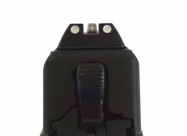 White 3-dot sight picture on a handgun