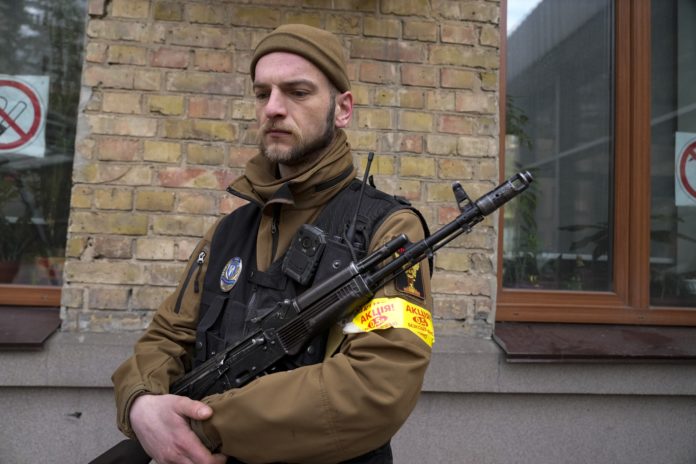 Ukraine Invasion civilian arms guns rifle ak