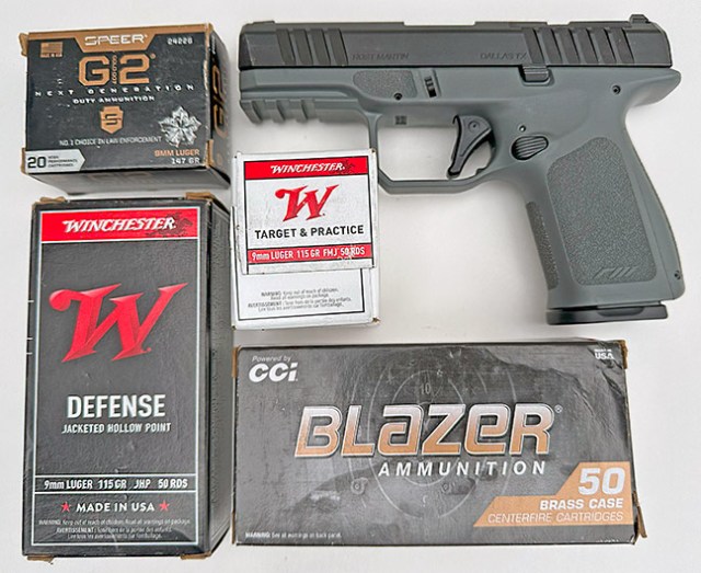 Rost Martin RM1C 9mm semi-auto handgun with Speer G12, Winchester Defense, Winchester White Boxes, and CCI Blazer ammunition boxes