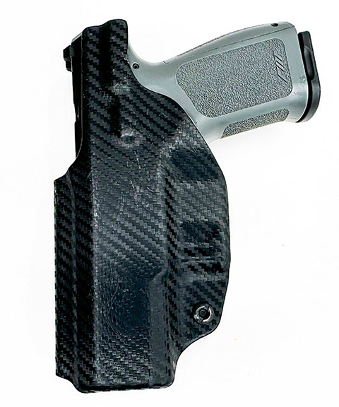Rost Martin RM1C 9mm gun in a Kydex holster