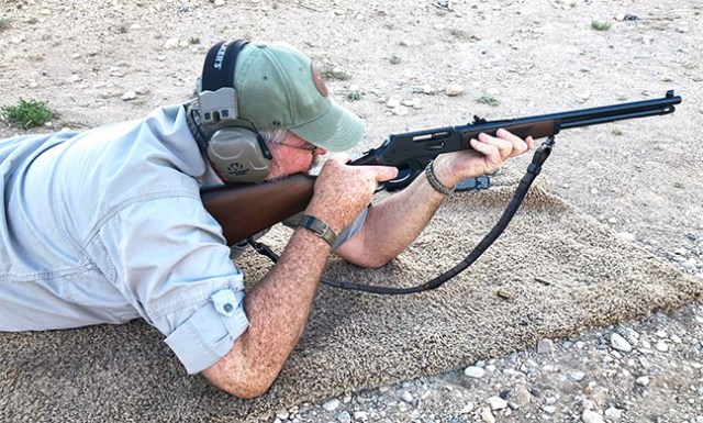 Terry Nelson firing the Henry Steel Lever Action rifle from a prone position