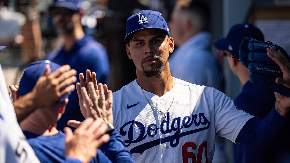 Edgardo Henriquez being congratulated by teammates