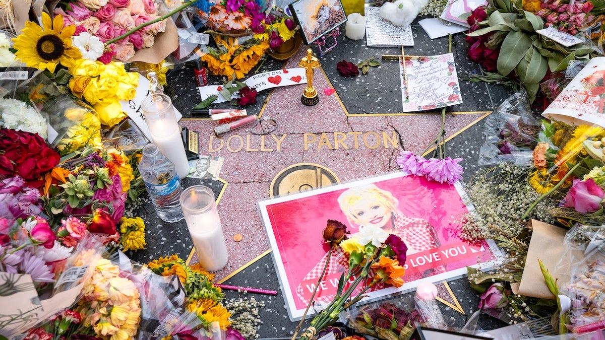 Fans of country music icon Dolly Parton pay tribute to her on The Music City Walk of Fame on August 25, 2026 in Nashville, Tennessee. Parton passed away at the age of 80. (Photo by Carly Mackler/Getty Images)