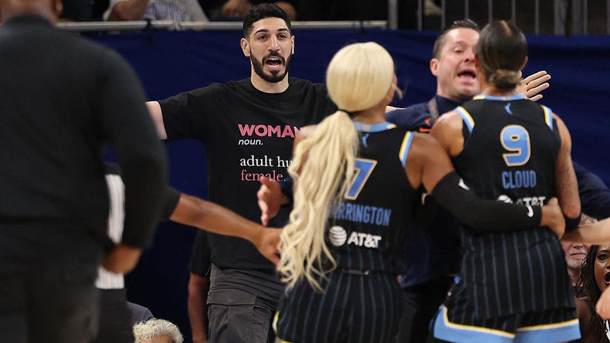 Former basketball player Enes Kanter Freedom and Natasha Cloud yell at one another during the second half between the Chicago Sky and the Indiana Fever at Wintrust Arena on August 23, 2026 in Chicago, Illinois.