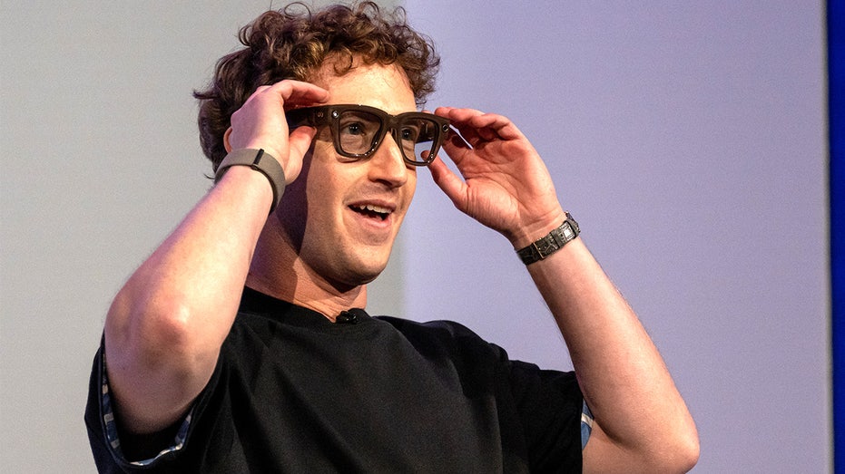 Mark Zuckerberg wears Meta Ray-Ban AI smart glasses during presentation.