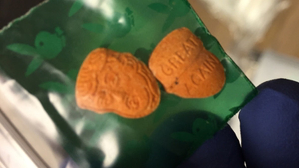 Indiana State Police released a photo showing ecstasy pills bearing President Trump's image and the words 