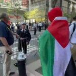 Firefighter caught on camera ripping pro-Palestinian agitator in Elmo costume near Ground Zero on 9/11