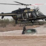 Arizona sheriff deploys helicopter to save 2 stranded in flooded car