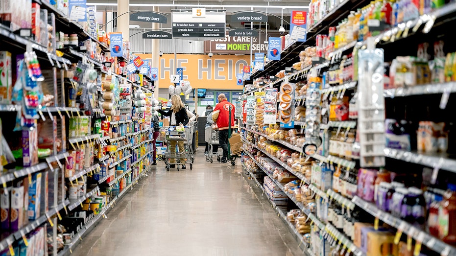 Shoppers inside a Kroger store.