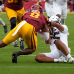 Oregon Ducks QB Dante Moore carted off the field after a vicious hit to the head against USC