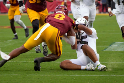 Oregon Ducks QB Dante Moore carted off the field after a vicious hit to the head against USC