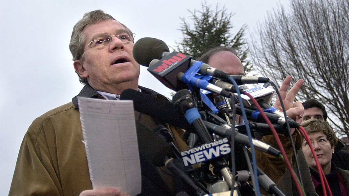 Rhode Island Governor, Donald Carcieri, speaks to the media February 22, 2003 in West Warwick, Rhode Island.