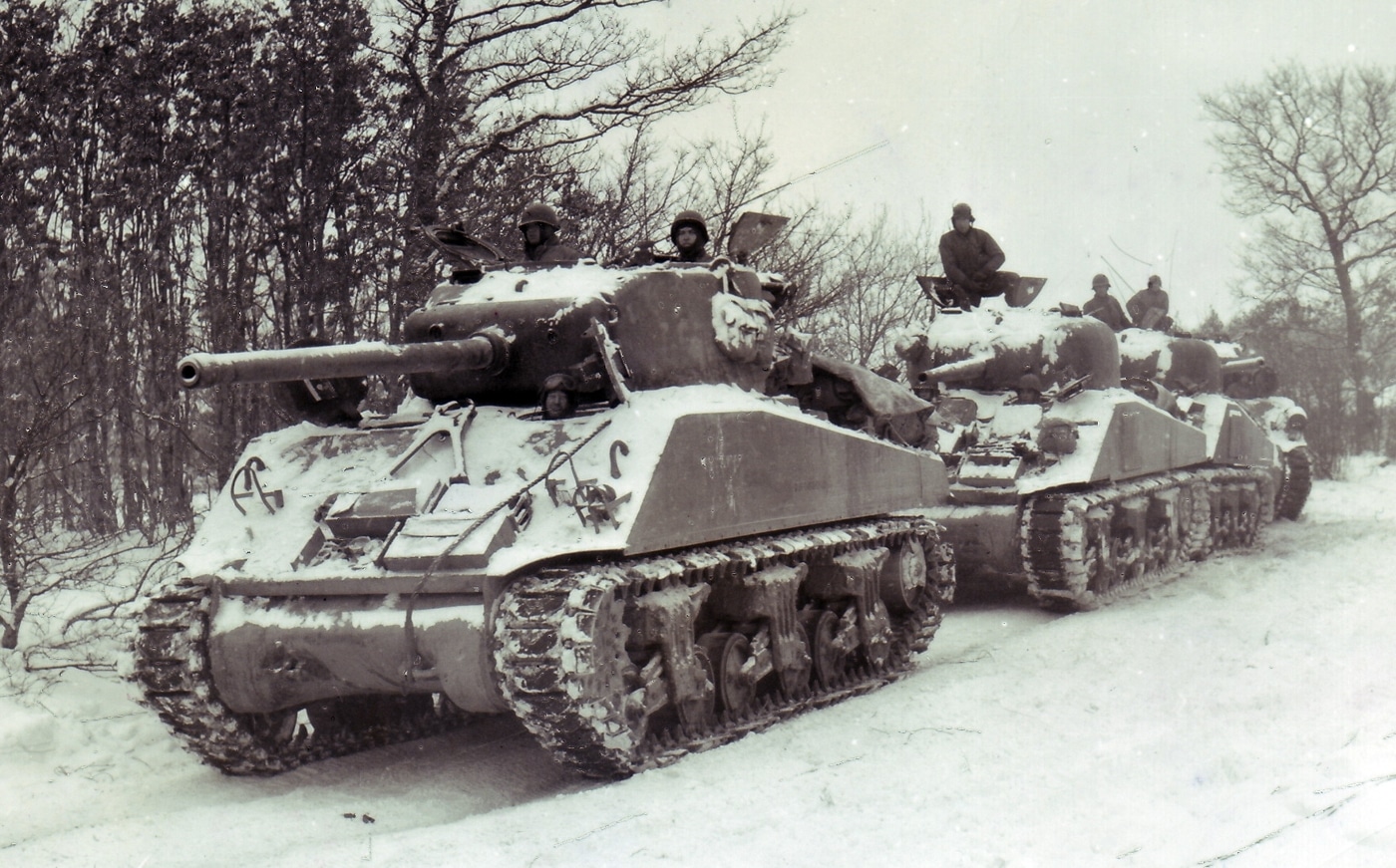 M4A3 Sherman tank armed with 76mm gun leads Shermans with 75mm guns in Luxembourg January 1945