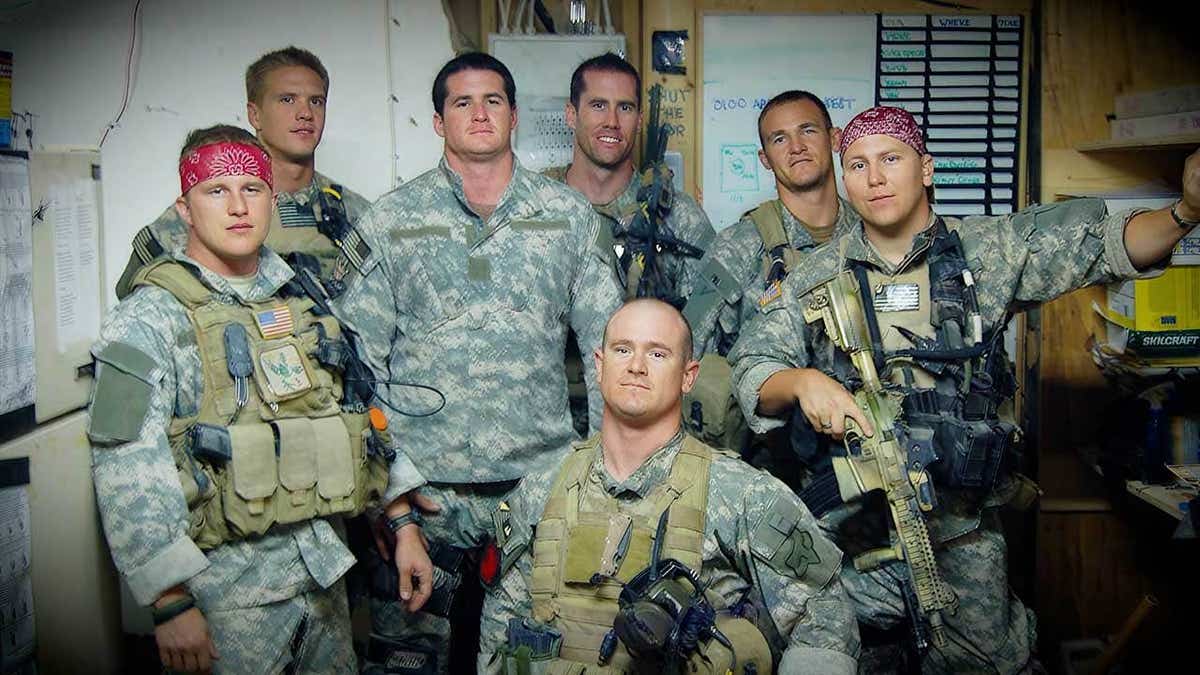 American military personnel are seen in uniform.