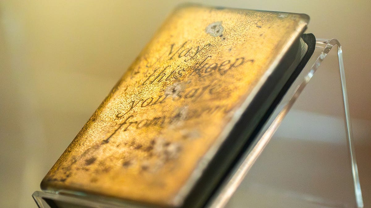 Metal-covered military pocket Bible