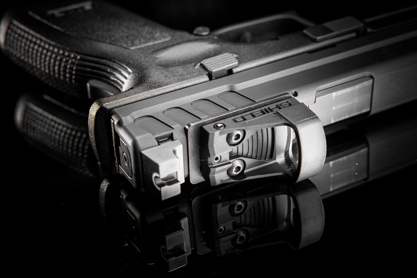 Shield red dot sight mounted on Springfield Armory XD pistol