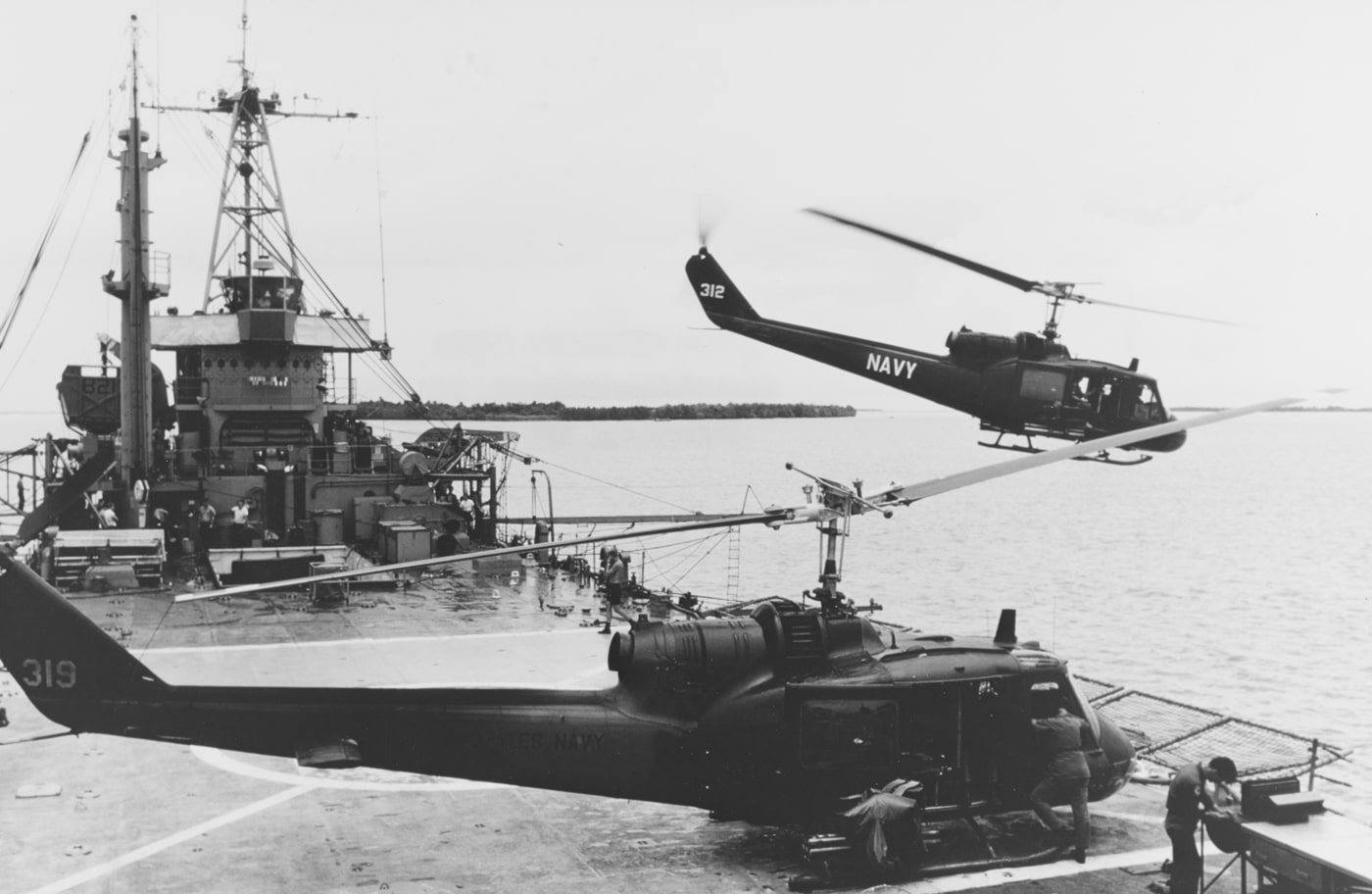 US Navy UH-1B helicopter takes off from the USS Harnett County LST-821 for a strike mission against the Viet Cong