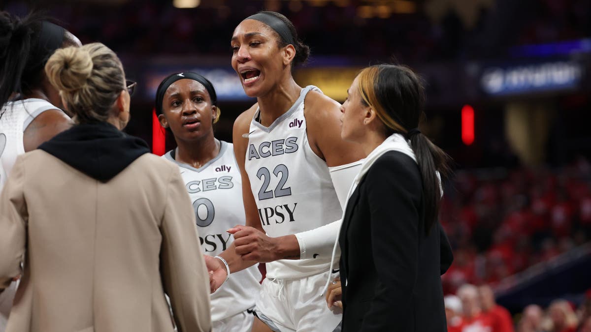 A'ja Wilson of the Las Vegas Aces reacts near the stands at Gainbridge Fieldhouse.