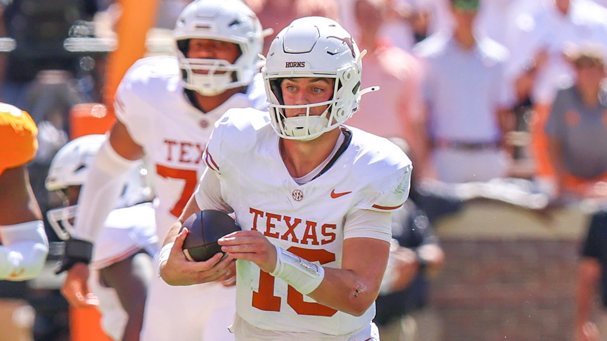 KNOXVILLE, TENNESSEE - SEPTEMBER 26: Arch Manning #16 of the Texas Longhorns carries the ball during a game between the Tennessee Volunteers and the Texas Longhorns at Neyland Stadium on September 26, 2026 in Knoxville, Tennessee. (Photo by Roger Wimmer/ISI Photos/ISI Photos via Getty Images)