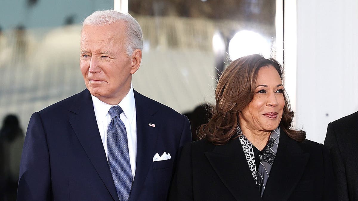 President Joe Biden and Vice President Kamala Harris stand together at the White House.