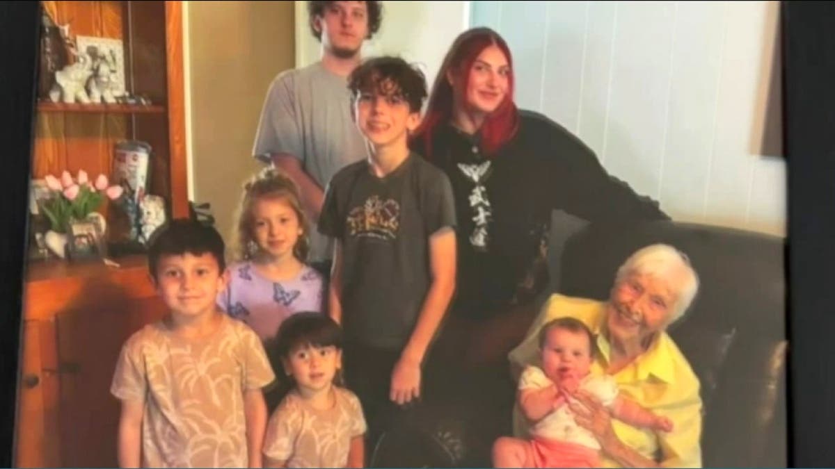 Blynda Vidock surrounded by her family.