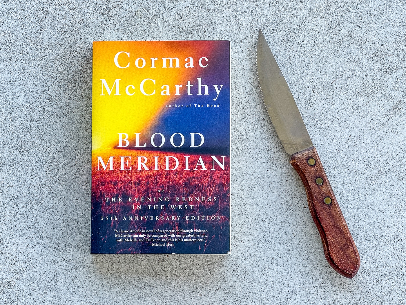 book Blood Meridian with a knife