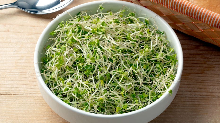 A bowl of broccoli sprouts.