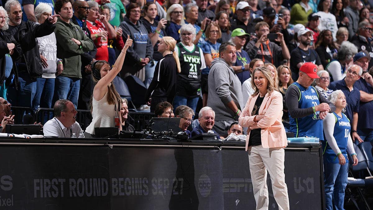 Cheryl Reeve looks on from the sideline during a Minnesota Lynx game.