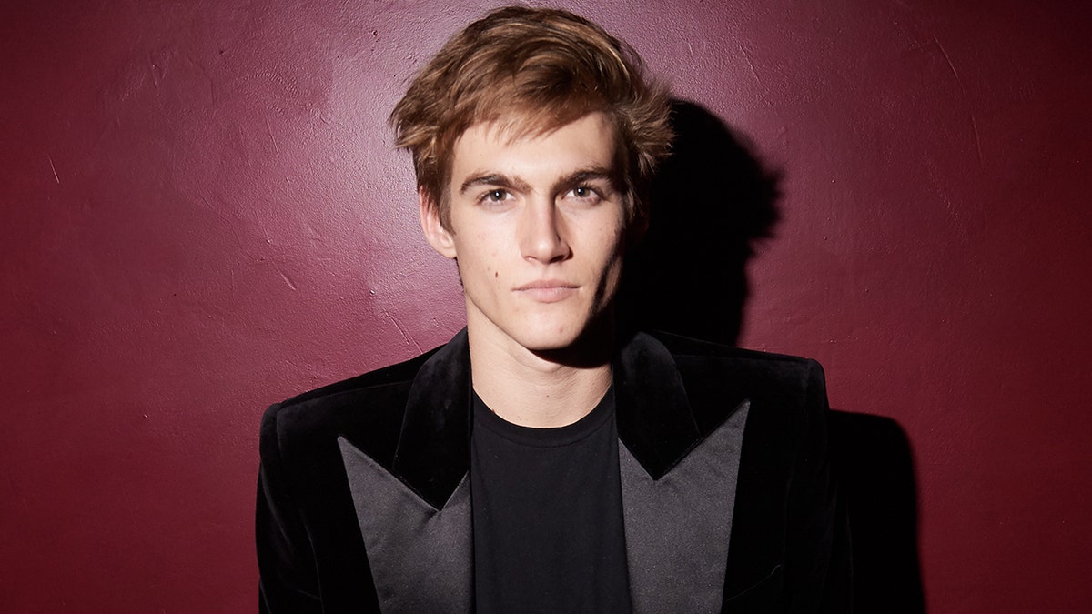 Photo of Presley Gerber with his family before his untimely death