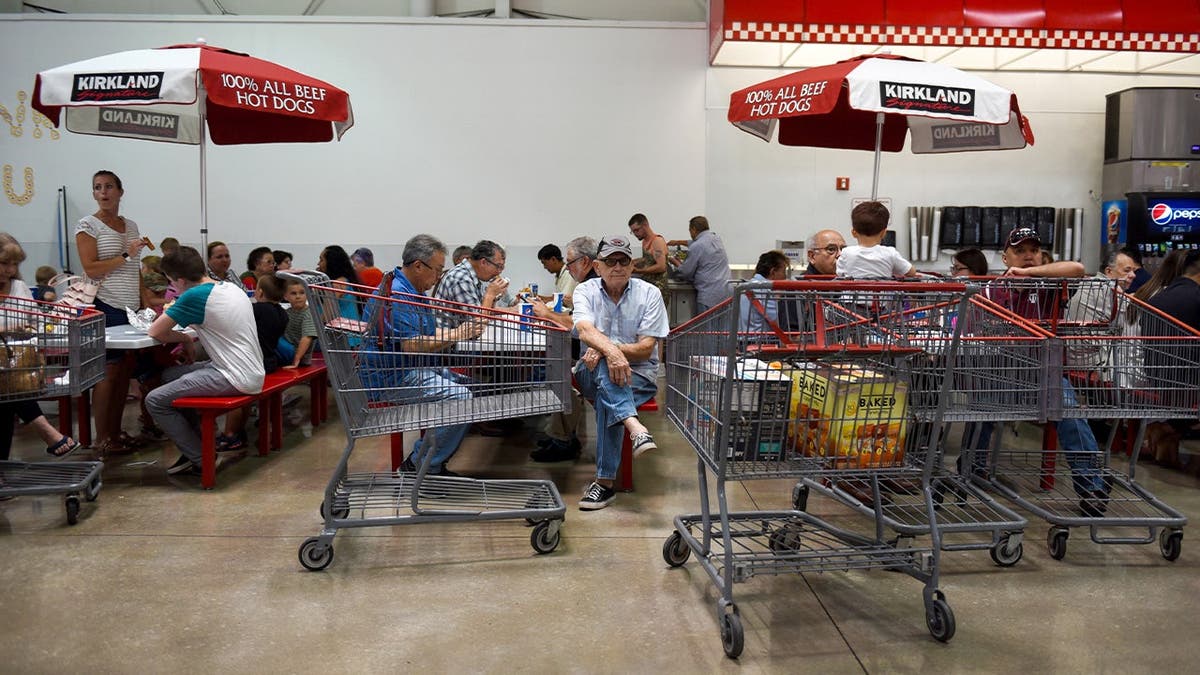 People hang out at Costco's food court.