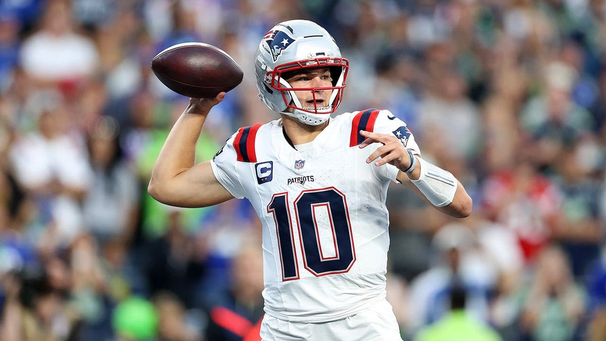 Drake Maye throws a pass during the third quarter against the Seattle Seahawks.