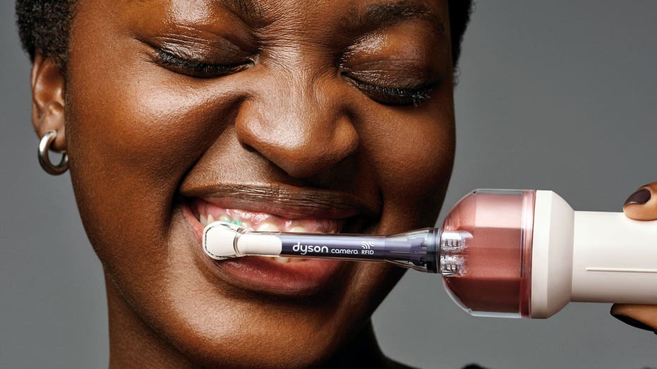 Dyson CameraJet toothbrush.