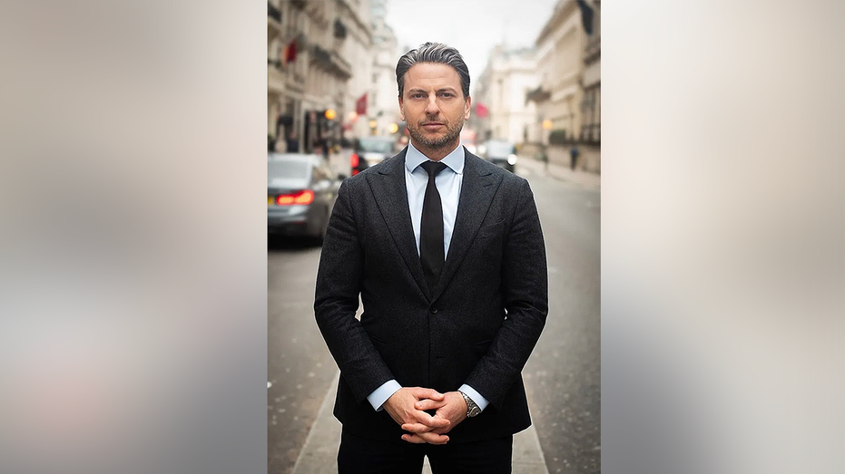 Nest Seekers International CEO Eddie Shapiro stands on a New York City street