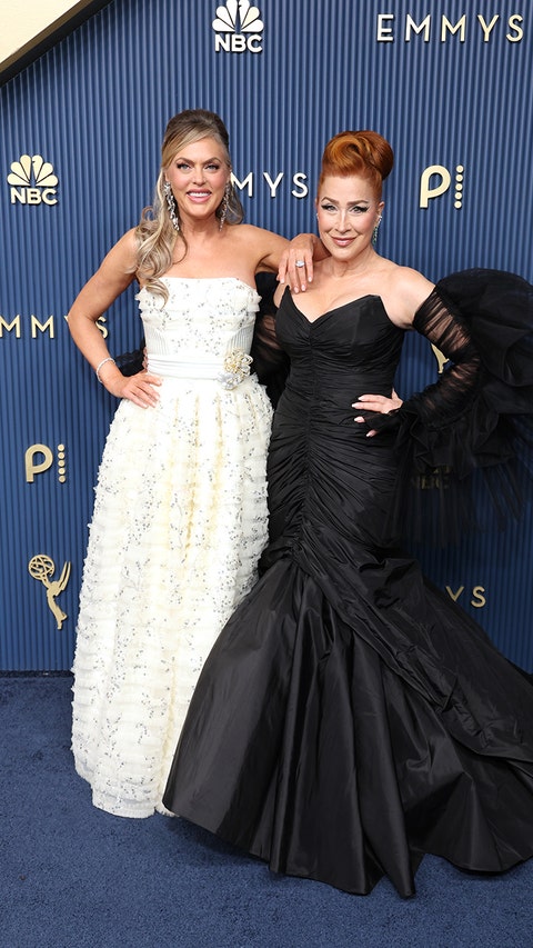 78th PRIMETIME EMMY AWARDS -- Pictured: (l-r) Elaine Hendrix and Lisa Ann Walter arrive to the 78th Primetime Emmy Awards held at the Peacock Theater on September 14, 2026. -- (Photo by: Jesse Grant/NBC via Getty Images)