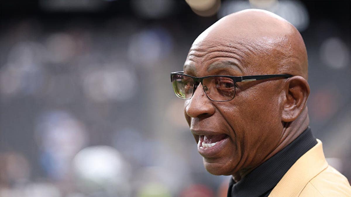 Eric Dickerson looks on before a Titans-Raiders game at Allegiant Stadium.
