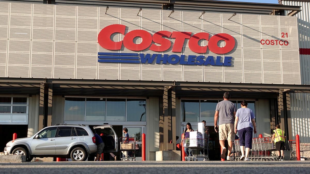 People arrive and depart at a Costco Wholesale store in Bayonne, New Jersey.