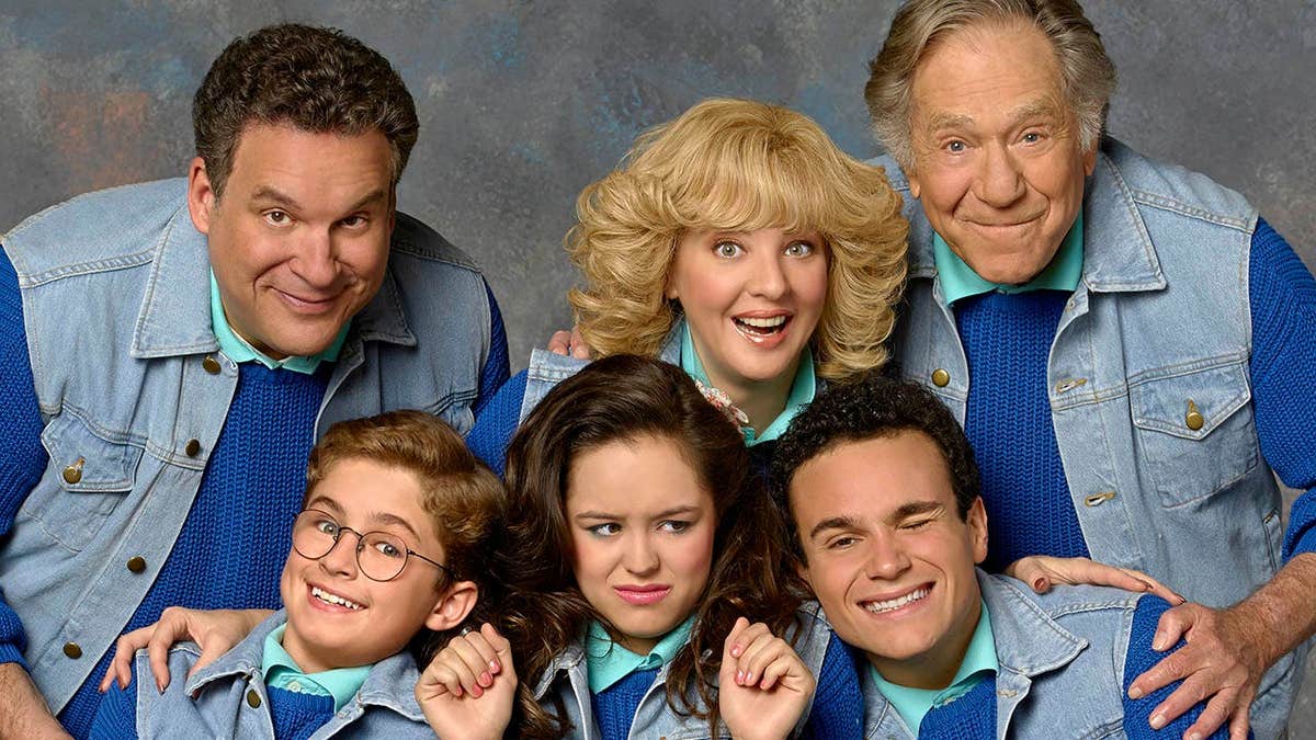 The Goldbergs cast poses together for a promotional photo.