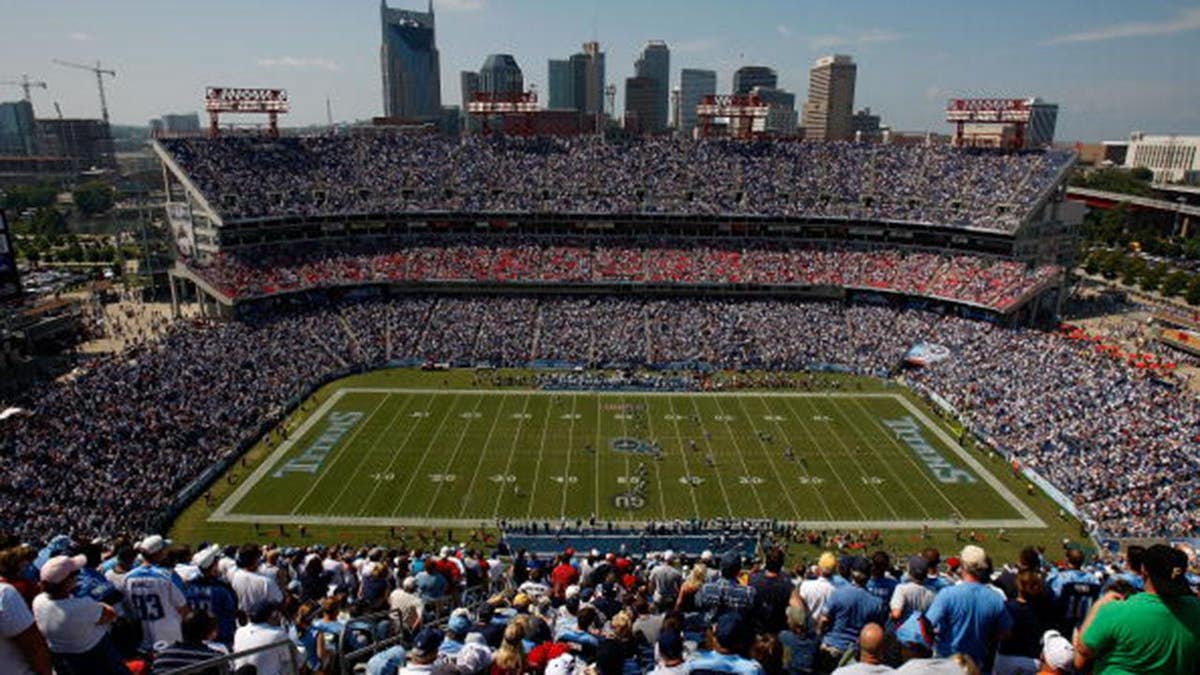 Jacksonville Jaguars and Tennessee Titans players line up for opening kickoff at LP Field.