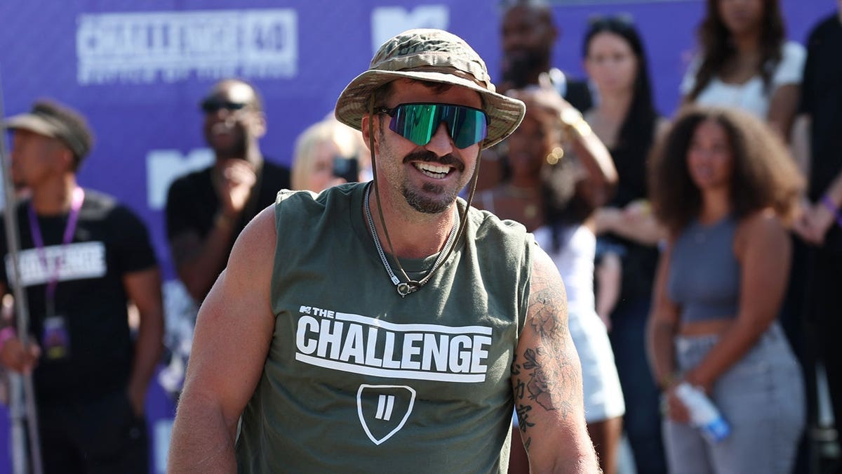 Johnny Devenanzio stands at MTV's The Challenge 40 event in Los Angeles.