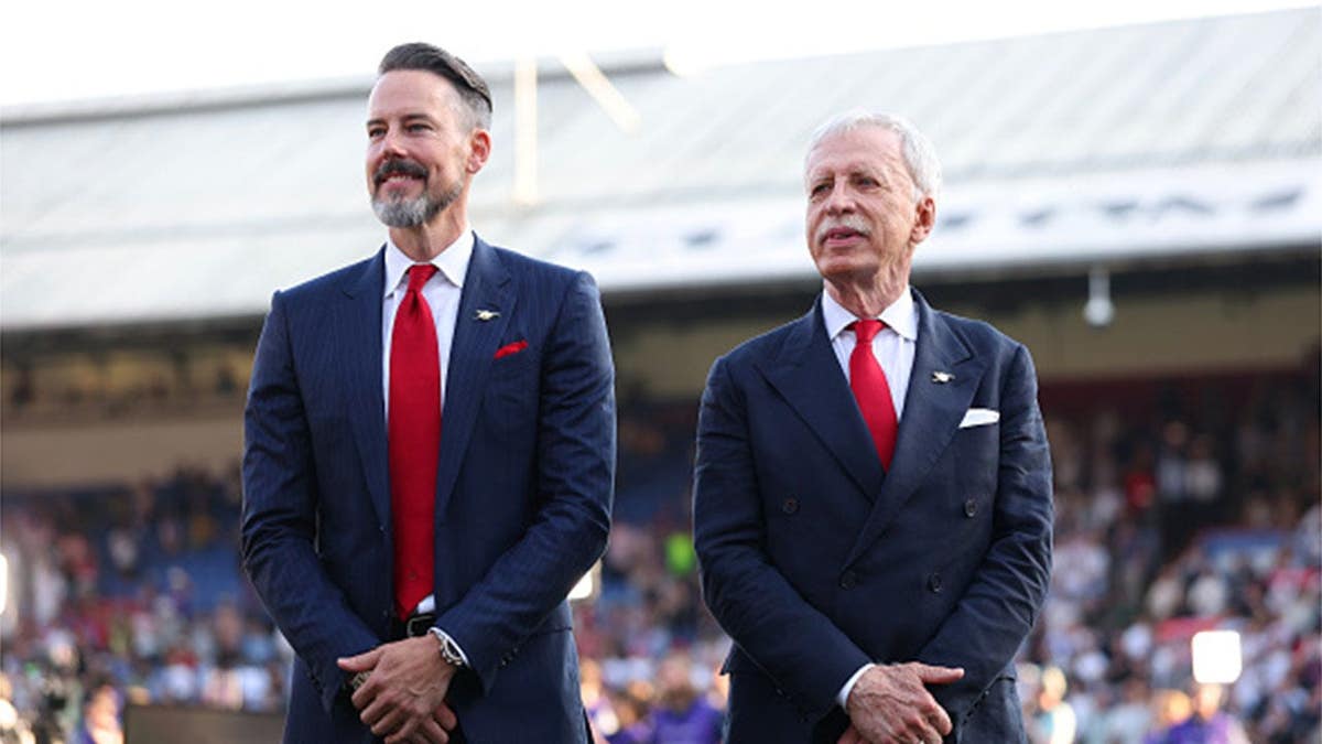 Josh Kroenke and Stan Kroenke look on during a Premier League soccer match at Selhurst Park.