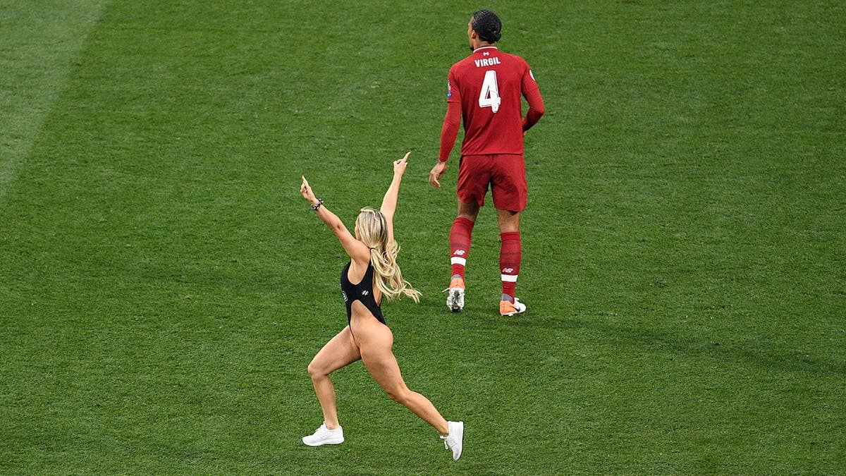 Kinsey Wolanski runs onto the field during the UEFA Champions League Final in Madrid.