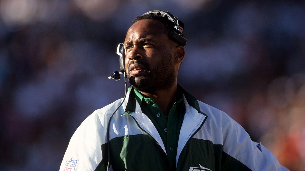 Kippy Brown, running backs coach for the New York Jets, looks on from the sideline.