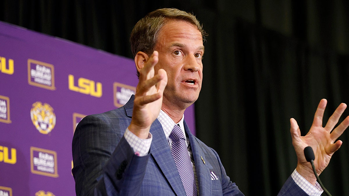 Lane Kiffin speaks at a press conference as he is introduced as the new head football coach of the LSU Tigers at Tiger Stadium in Baton Rouge, Louisiana, on Dec. 1, 2025.