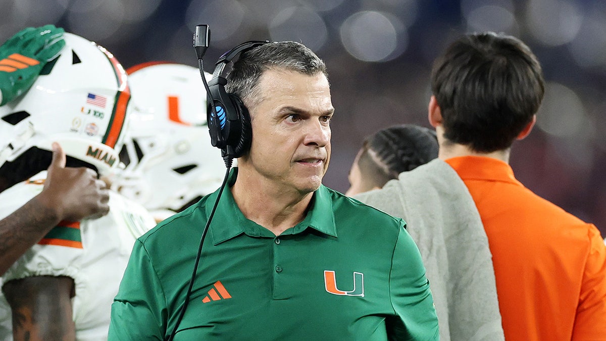 Mario Cristobal of the Miami Hurricanes looks on in the fourth quarter against the Ole Miss Rebels during the College Football Playoff Semifinal at the VRBO Fiesta Bowl at State Farm Stadium on Jan. 8, 2026 in Glendale, Arizona.