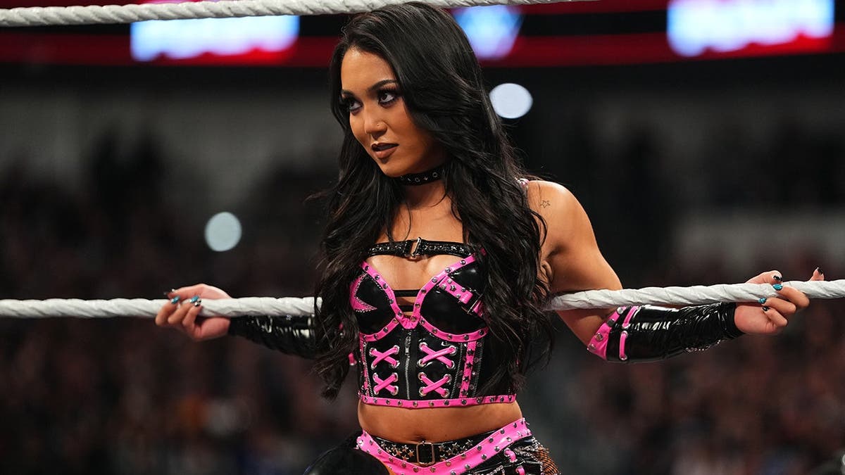 Roxanne Perez makes her entrance during Monday Night RAW at American Airlines Center.